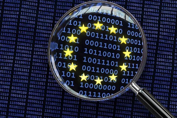 EU-branded magnifying glass examining data