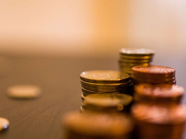 coins stacked on a desk