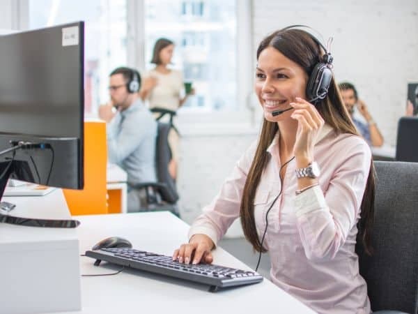 customer service operator in headset working in call centre