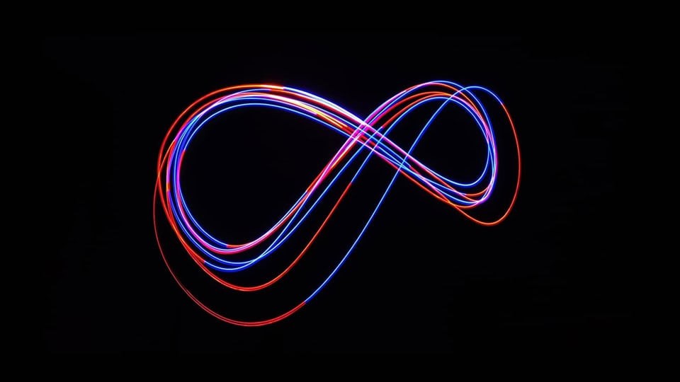 red and blue light in an infinity sign